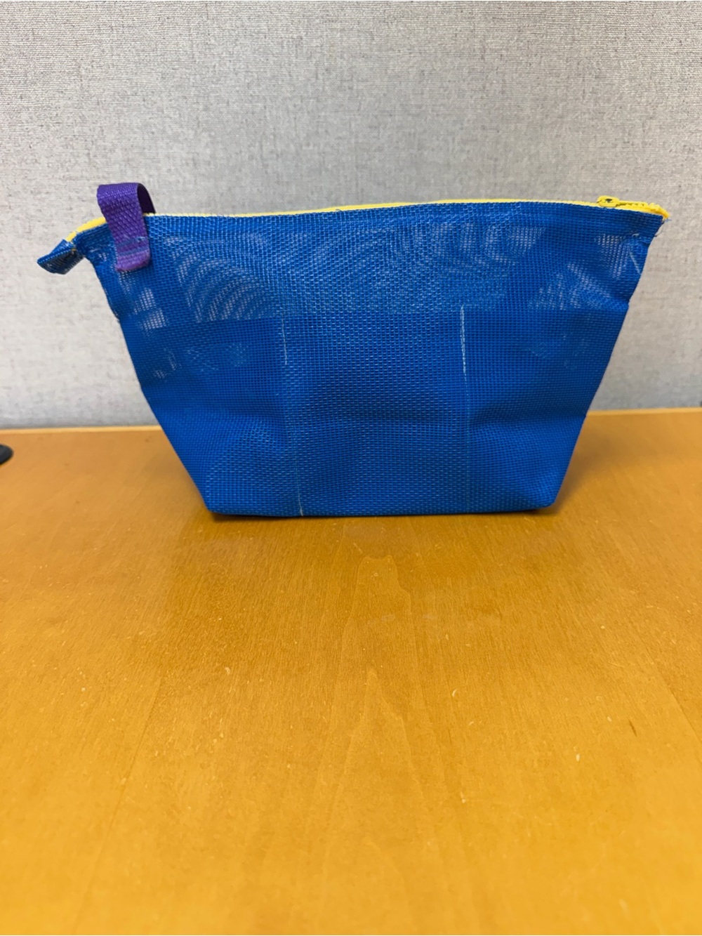Blue Mesh Toiletry Pouch with Yellow Zipper